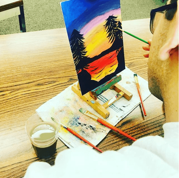 Art Healing Hearts participant painting
