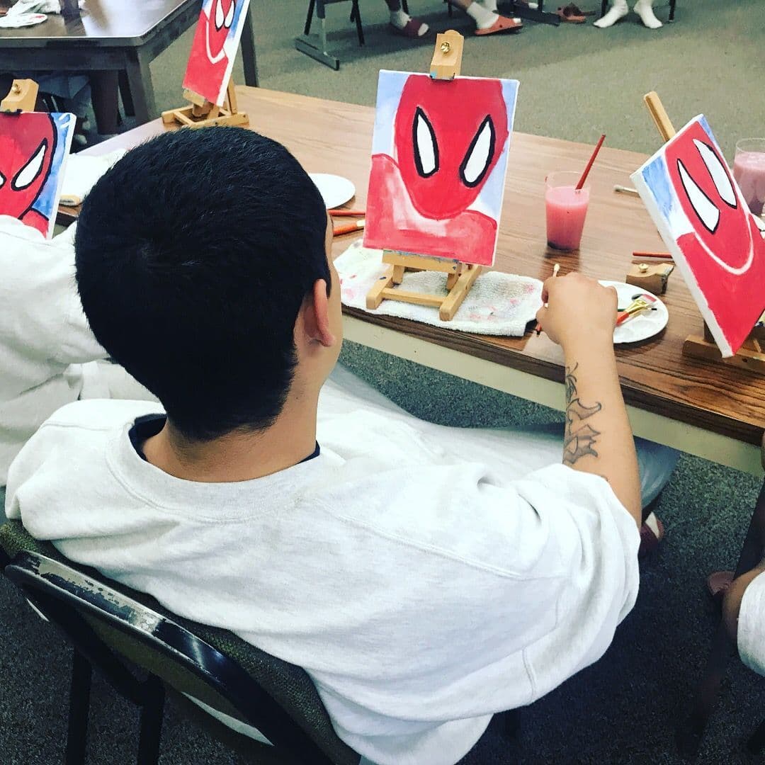 Art Healing Hearts participant painting