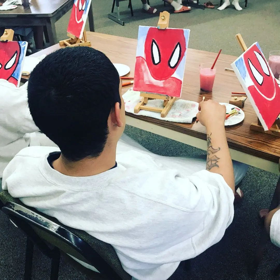 Art Healing Hearts participant painting